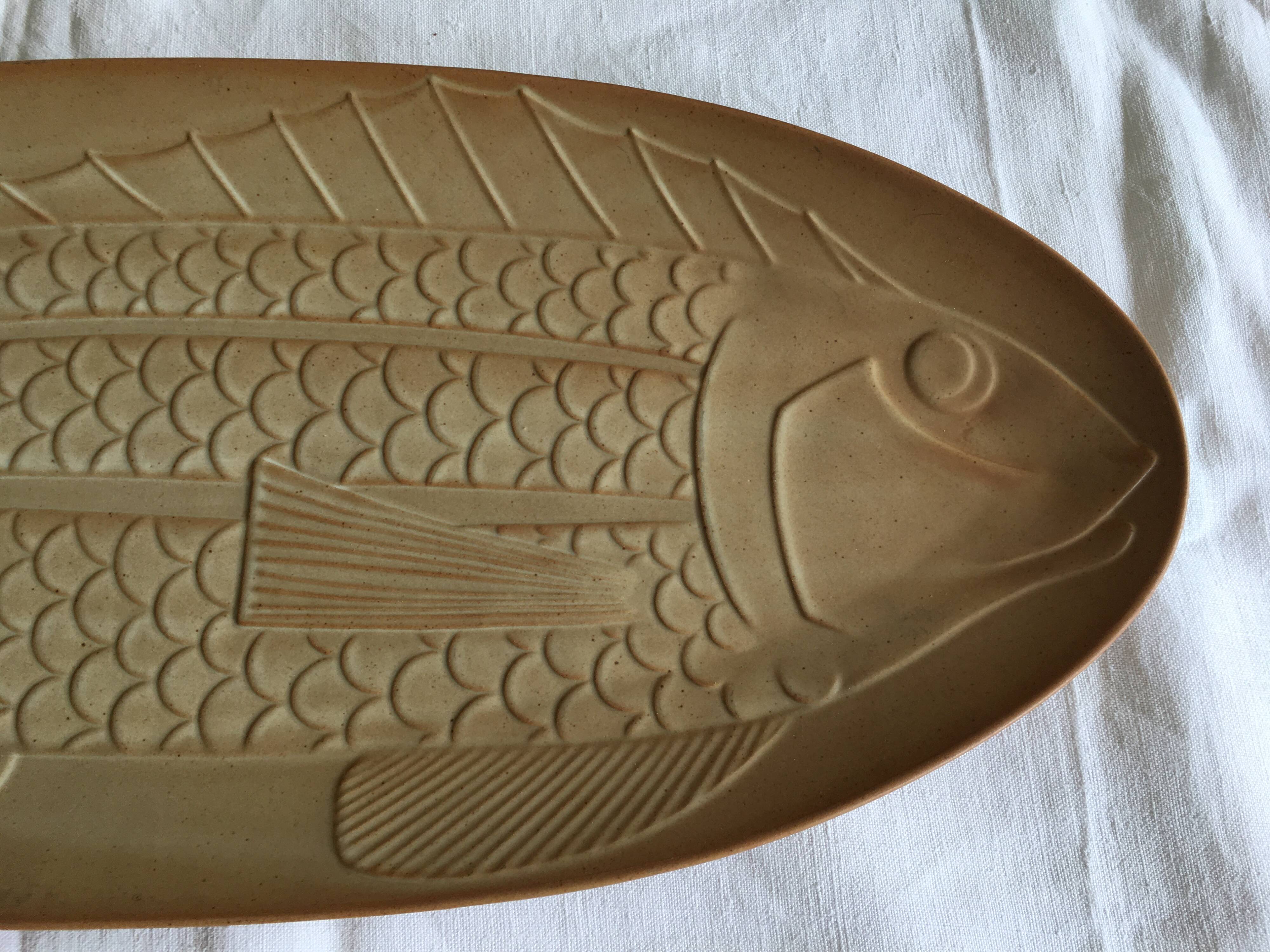 Very large fish dish stamped “Grès CNP Village France”