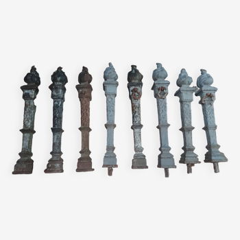 Set of 8 Louis XVI cast iron bollard posts, 19th century