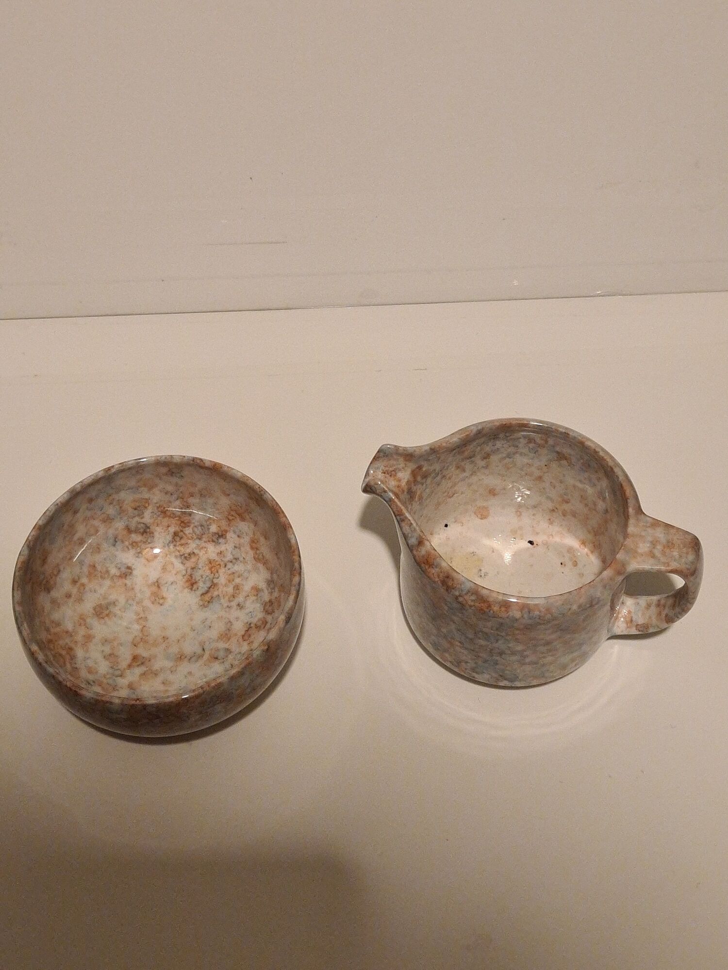 Porcelain milk jug and sugar bowl from Virebent Puy l'Evêque