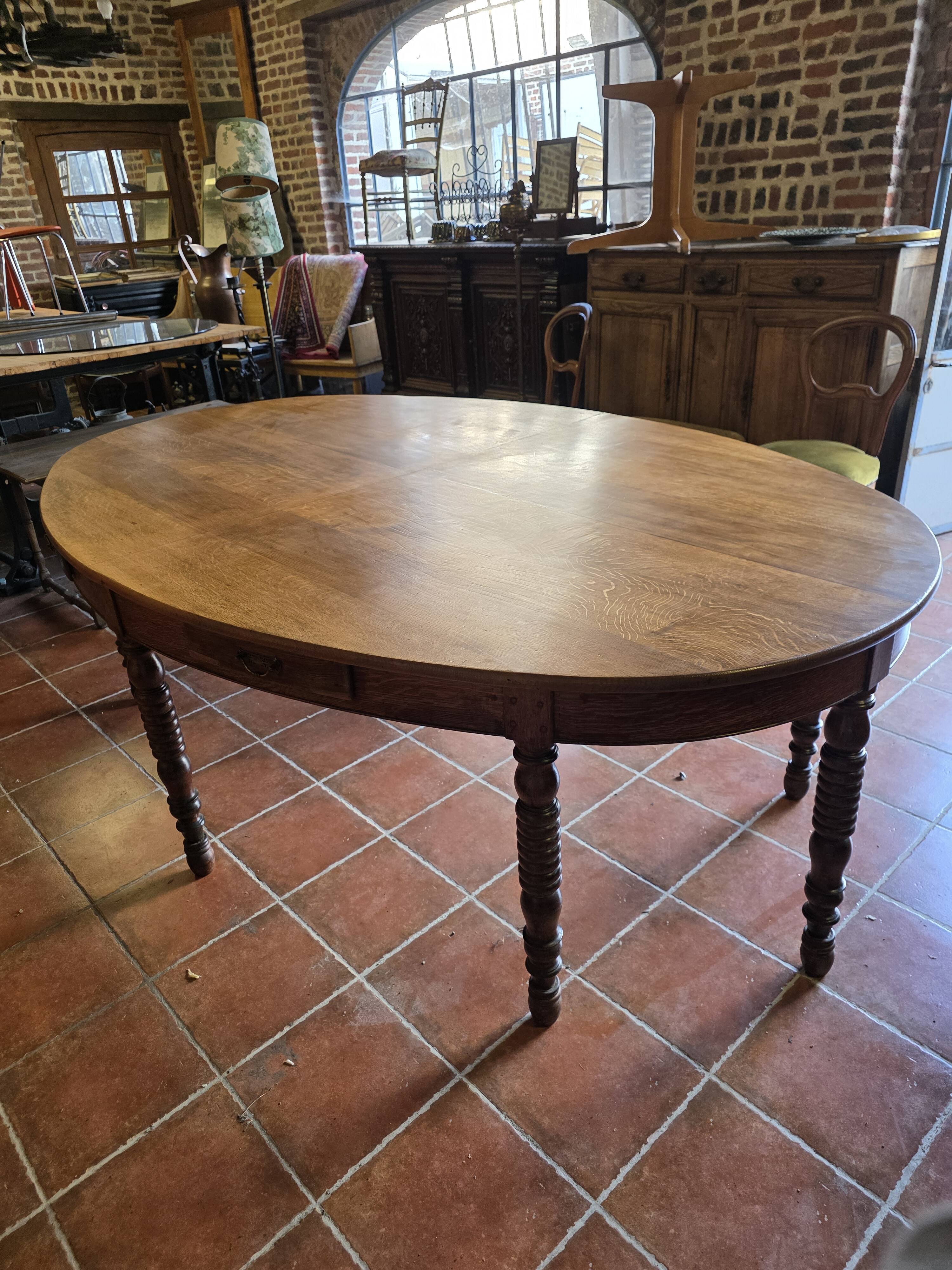 Large oval monastery table in solid oak, 19th century, 243×154cm