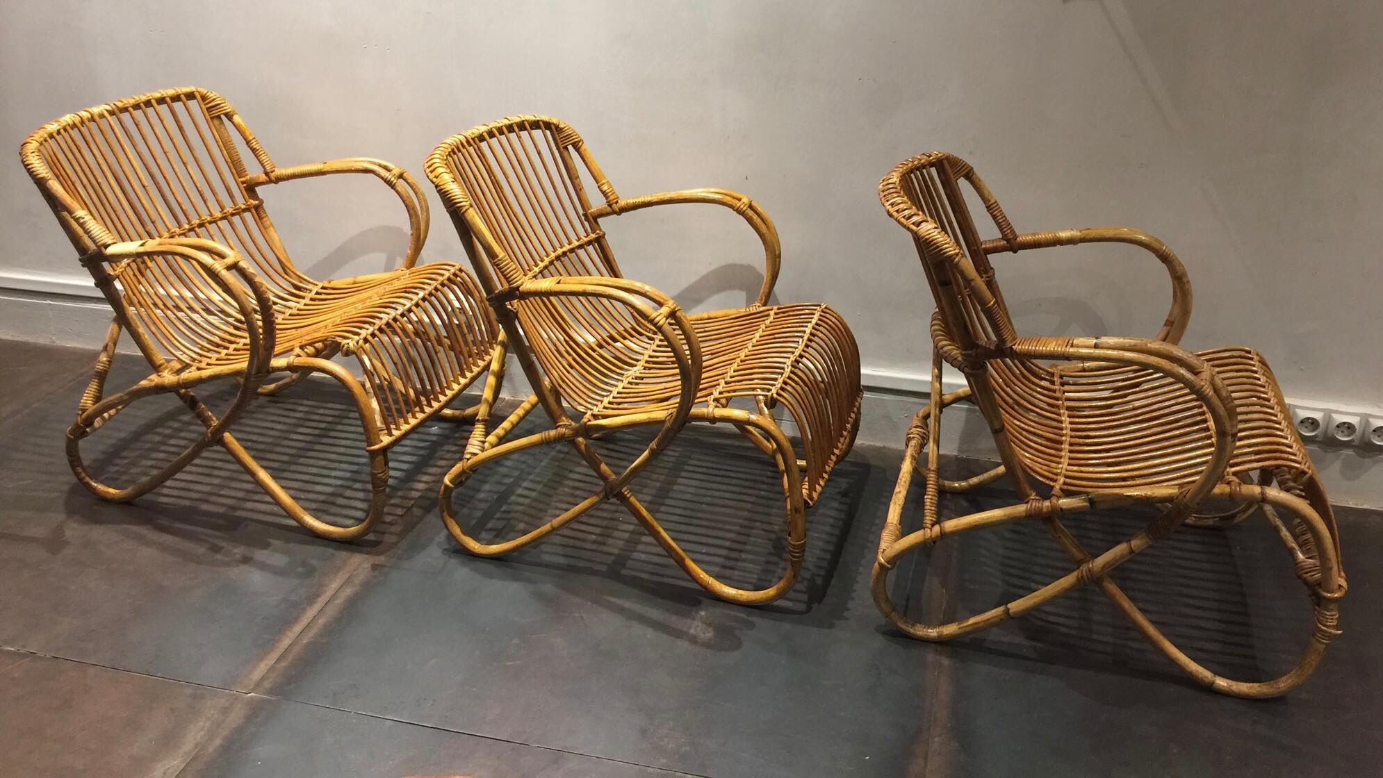 Set de trois fauteuils en rotin