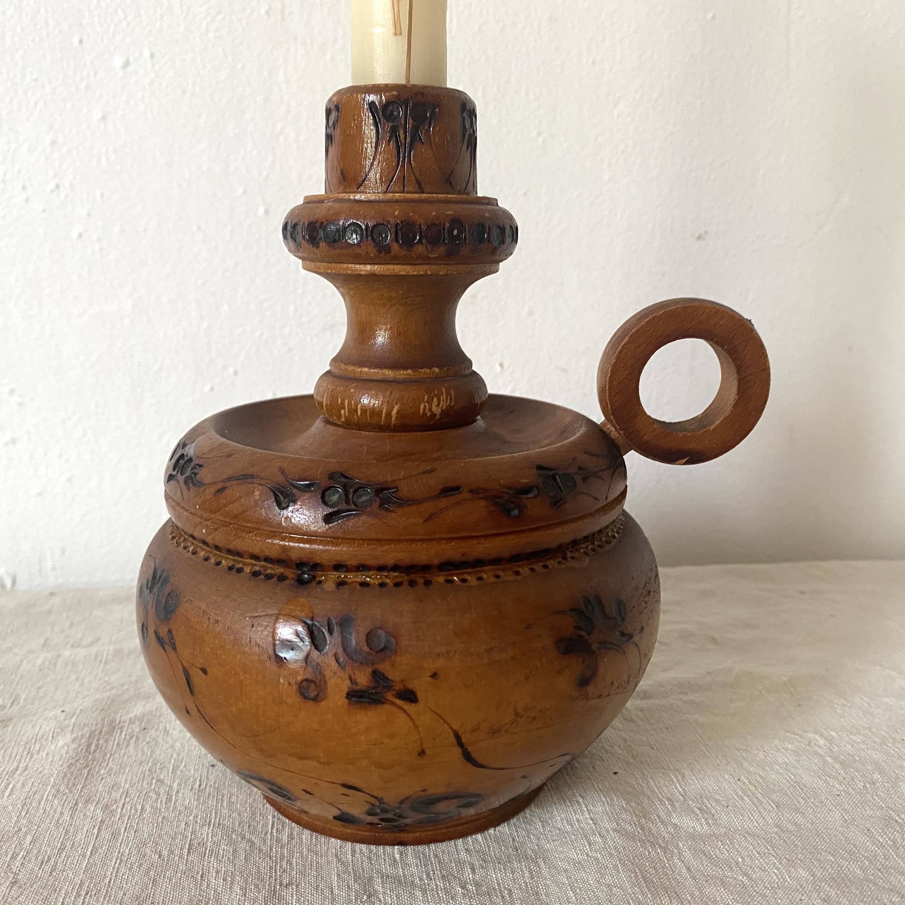 Wooden thumb candle holder