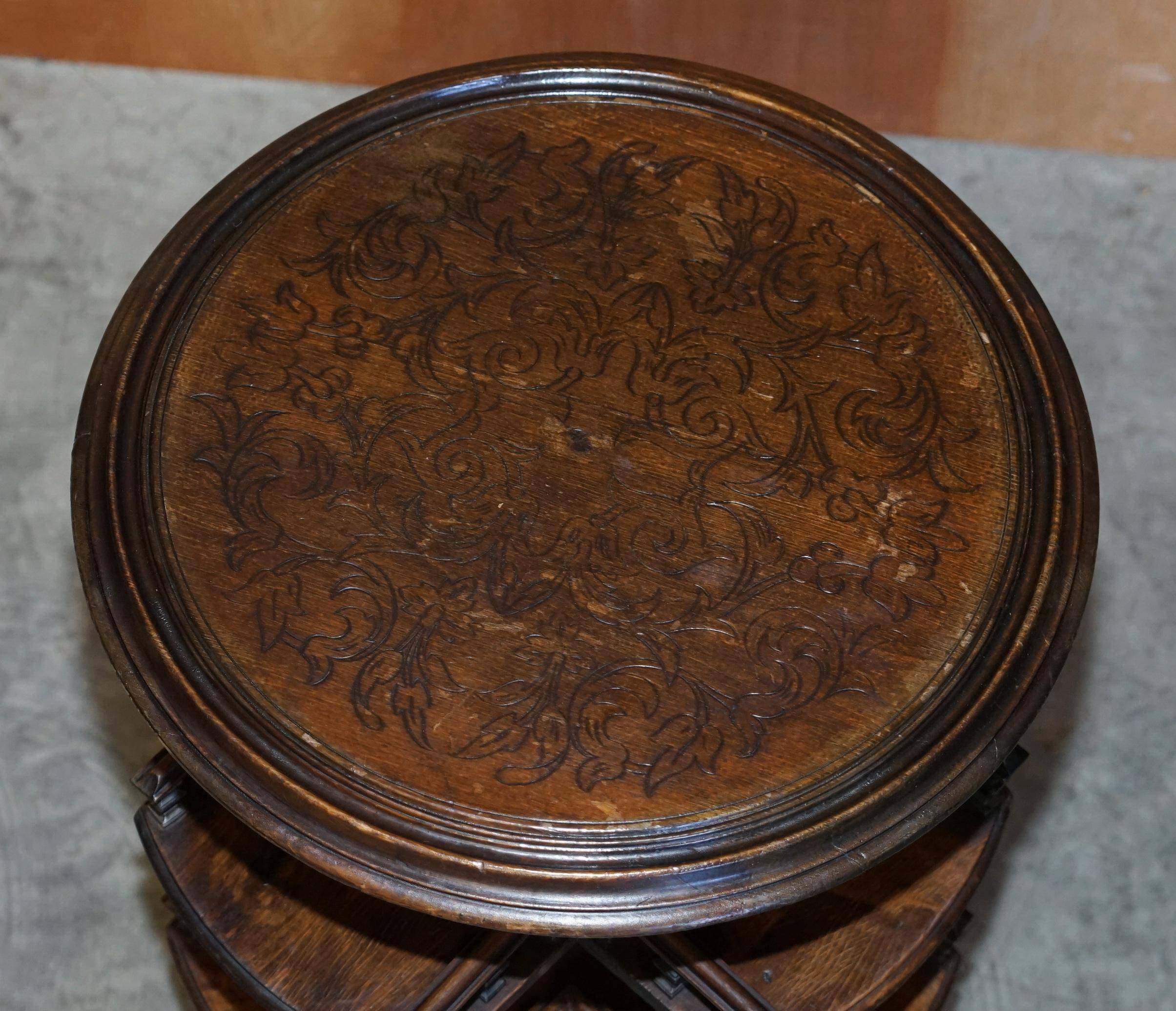 Victorian oak library table, two levels, pokerwork top.
