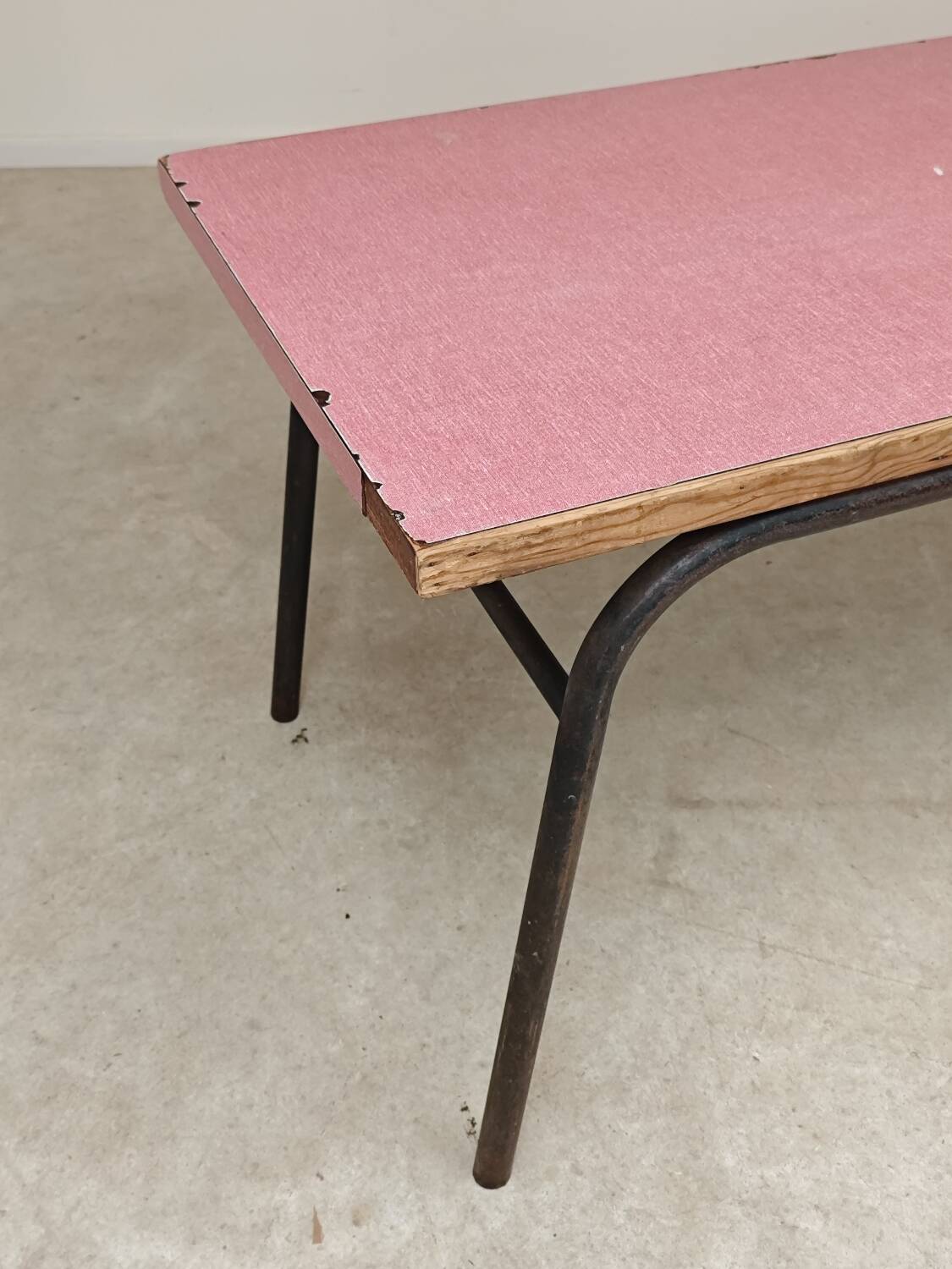 Large canteen table in pink formica and metal.