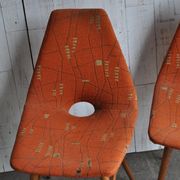 Pair of multicoloured fabric and wood Erika chairs — Judit Burián for SZKIV, 1959