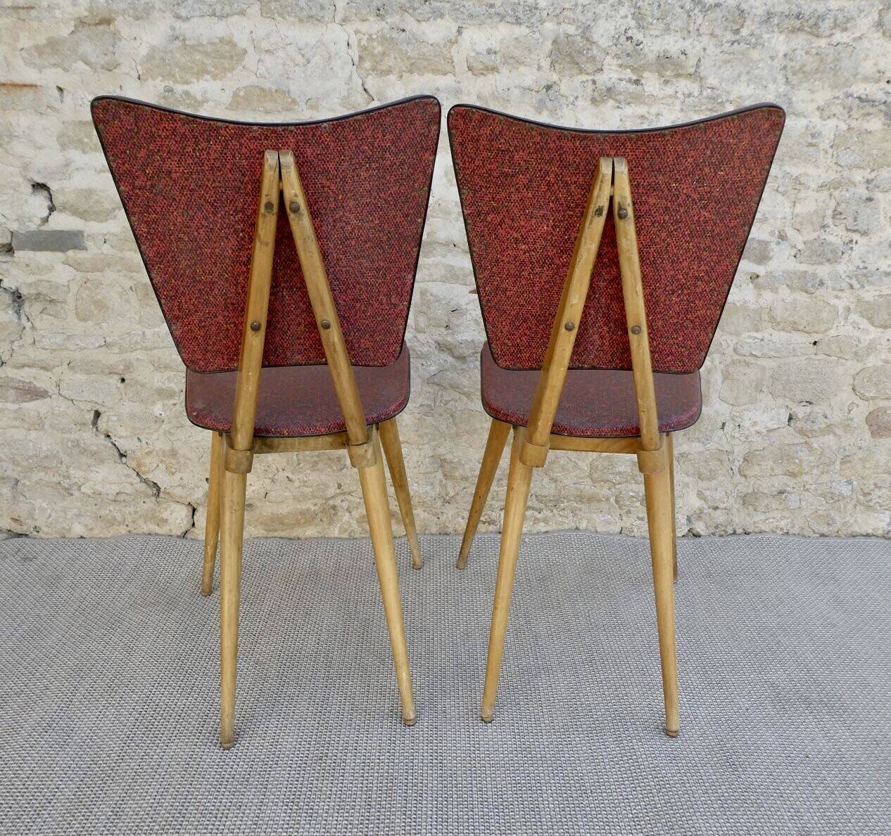 Pair of light wood chairs with Skai, around 1950.