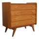 Vintage 1960s commode with tapered legs.