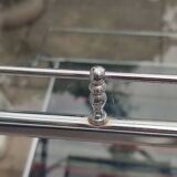 Chrome-plated metal serving trolley