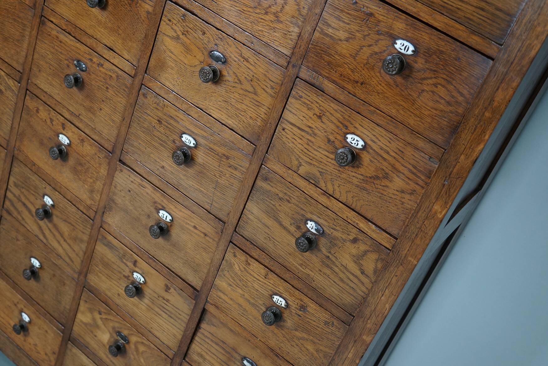 Large dutch oak apothecary cabinet / barber cabinet with enamel shields, 1900s