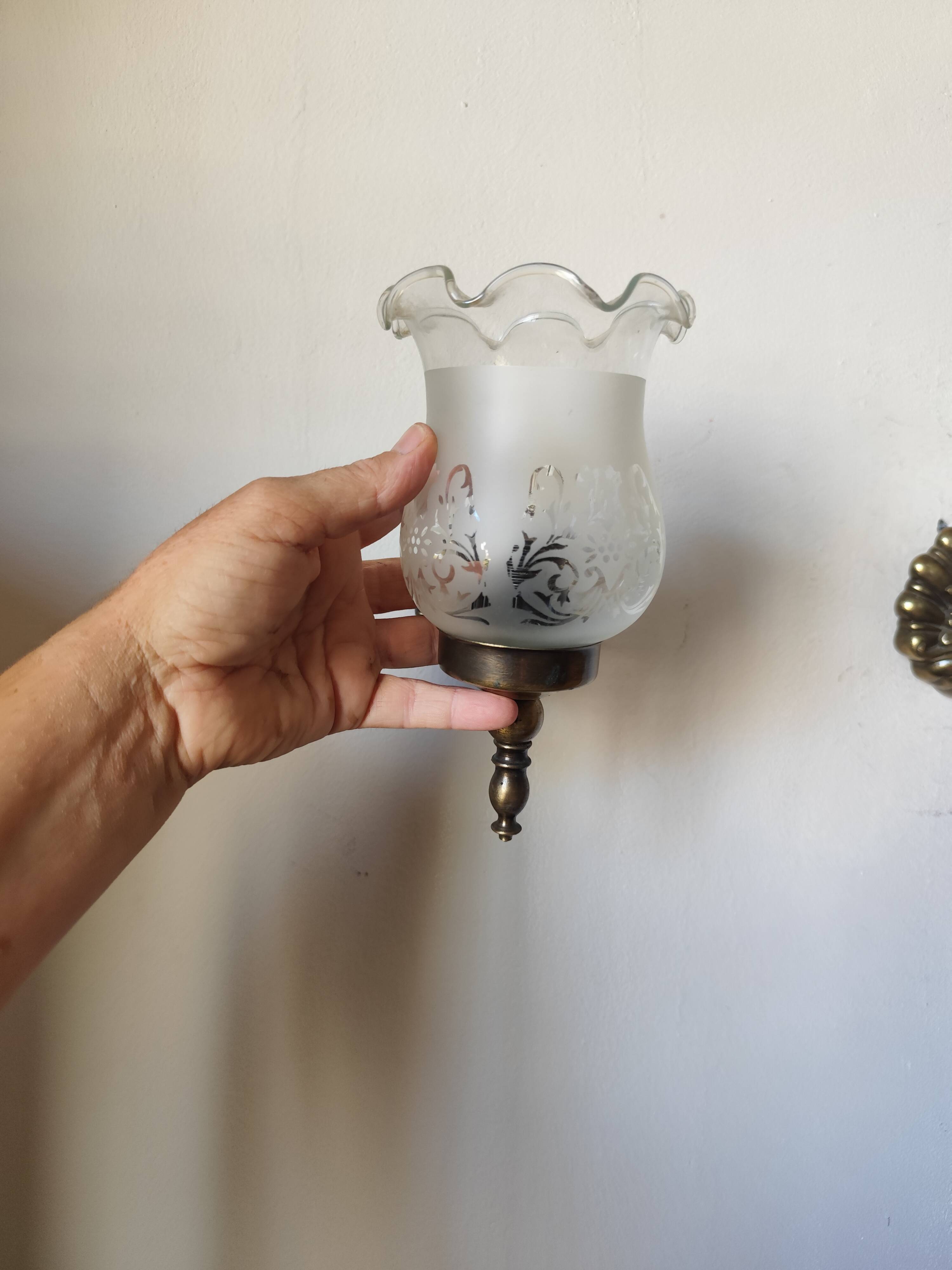 Pair of wall sconces in bronze with opaline glass tulips.