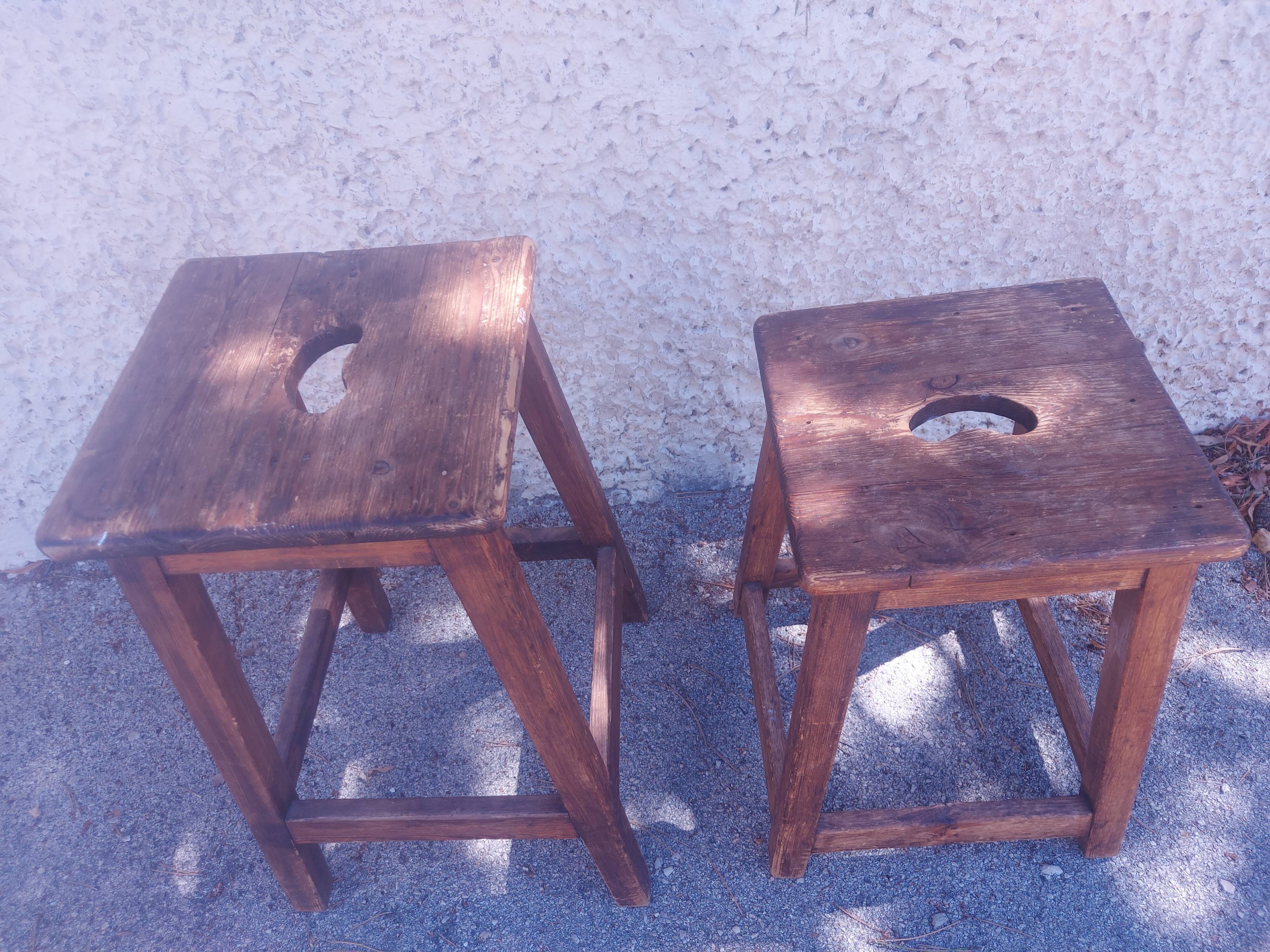 Two vintage wooden stools