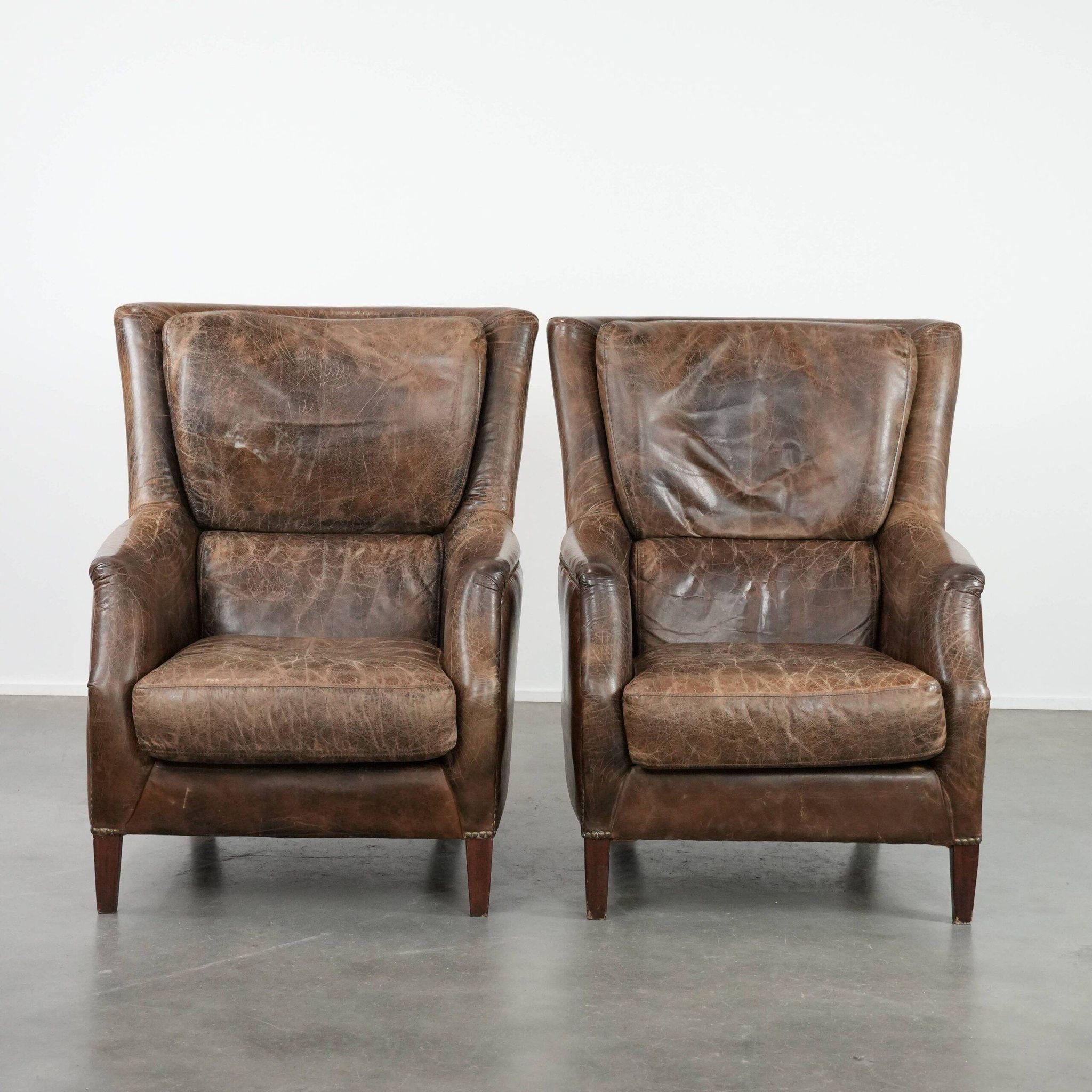 Very comfortable set of two vintage cowhide leather armchairs