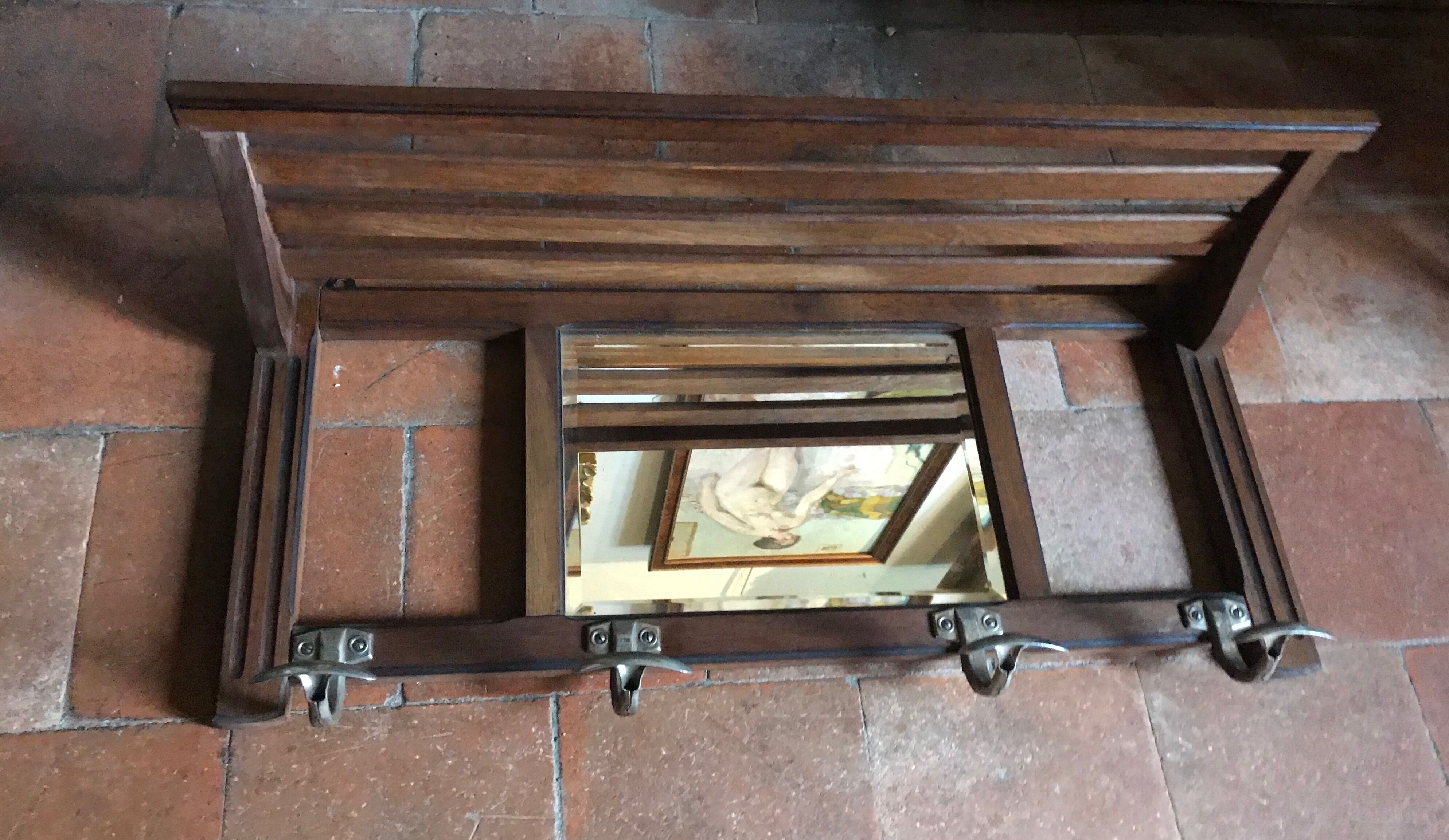 Coat hanger with mirror