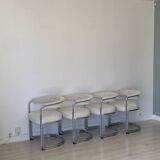 4 vintage tubular metal and fabric chairs