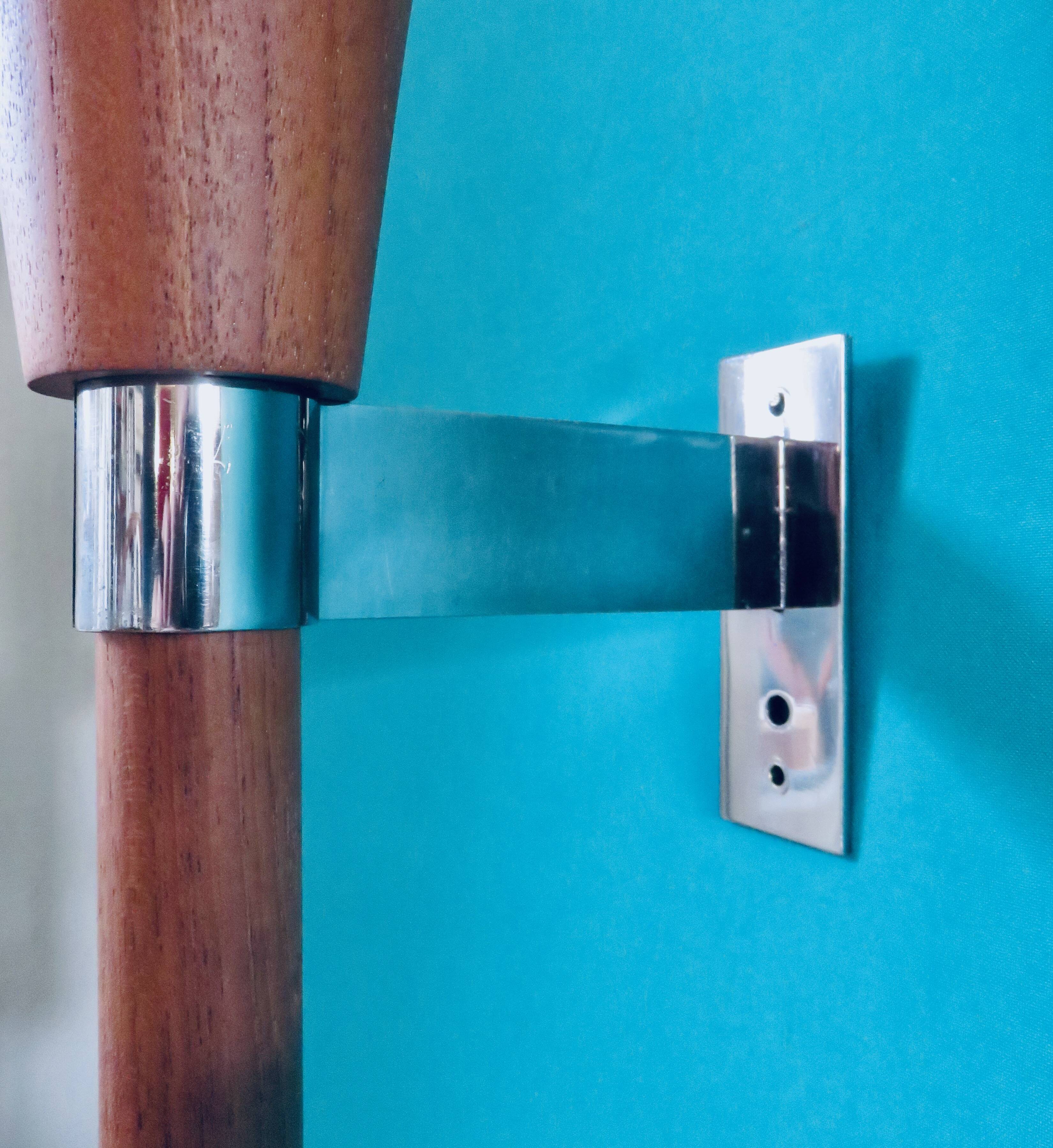 Wall lamp in torch, teak and opaline. Sweden 1960
