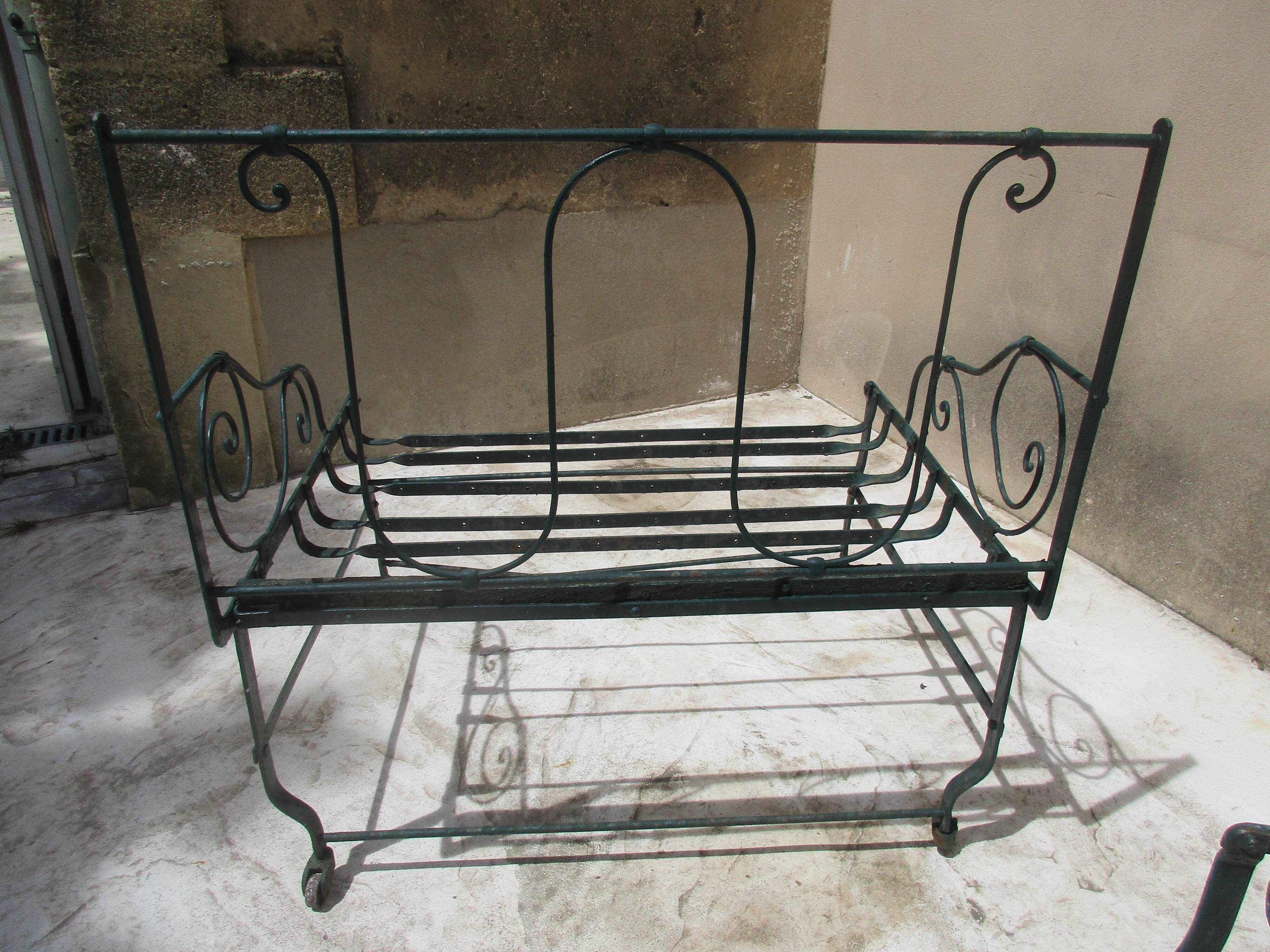 Pair of iron garden chairs forge