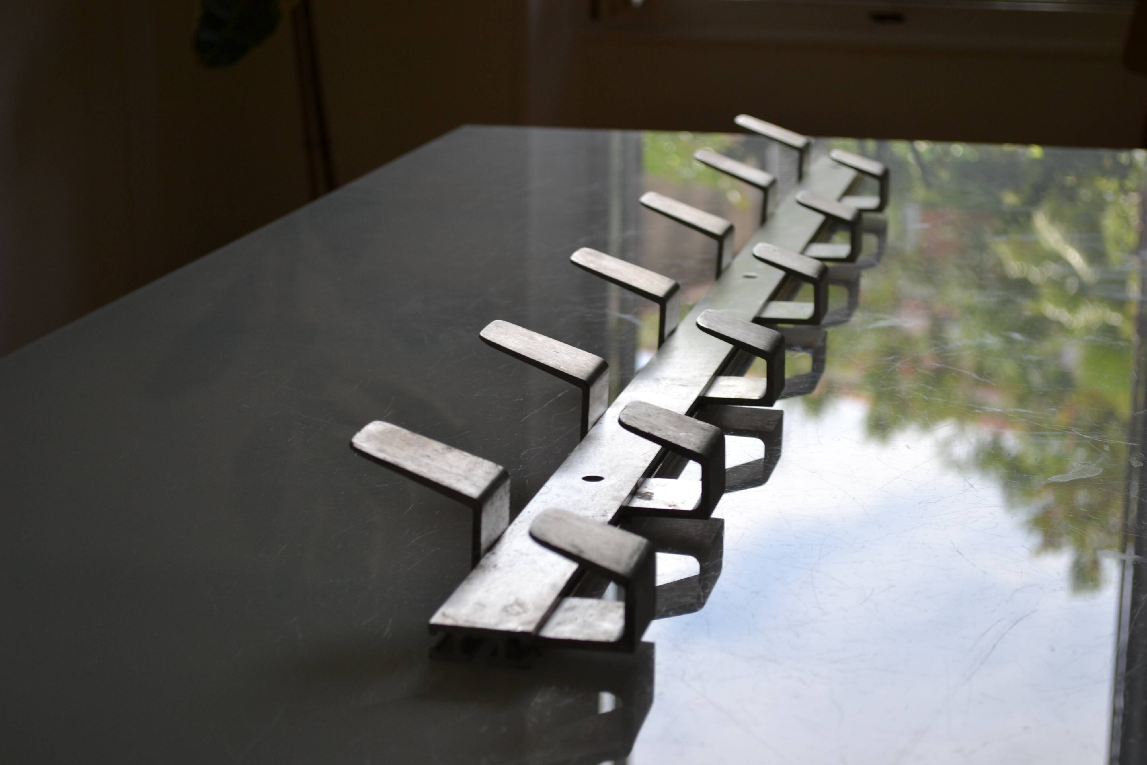 Vintage 70s brushed aluminum metal 12-hook wall coat rack