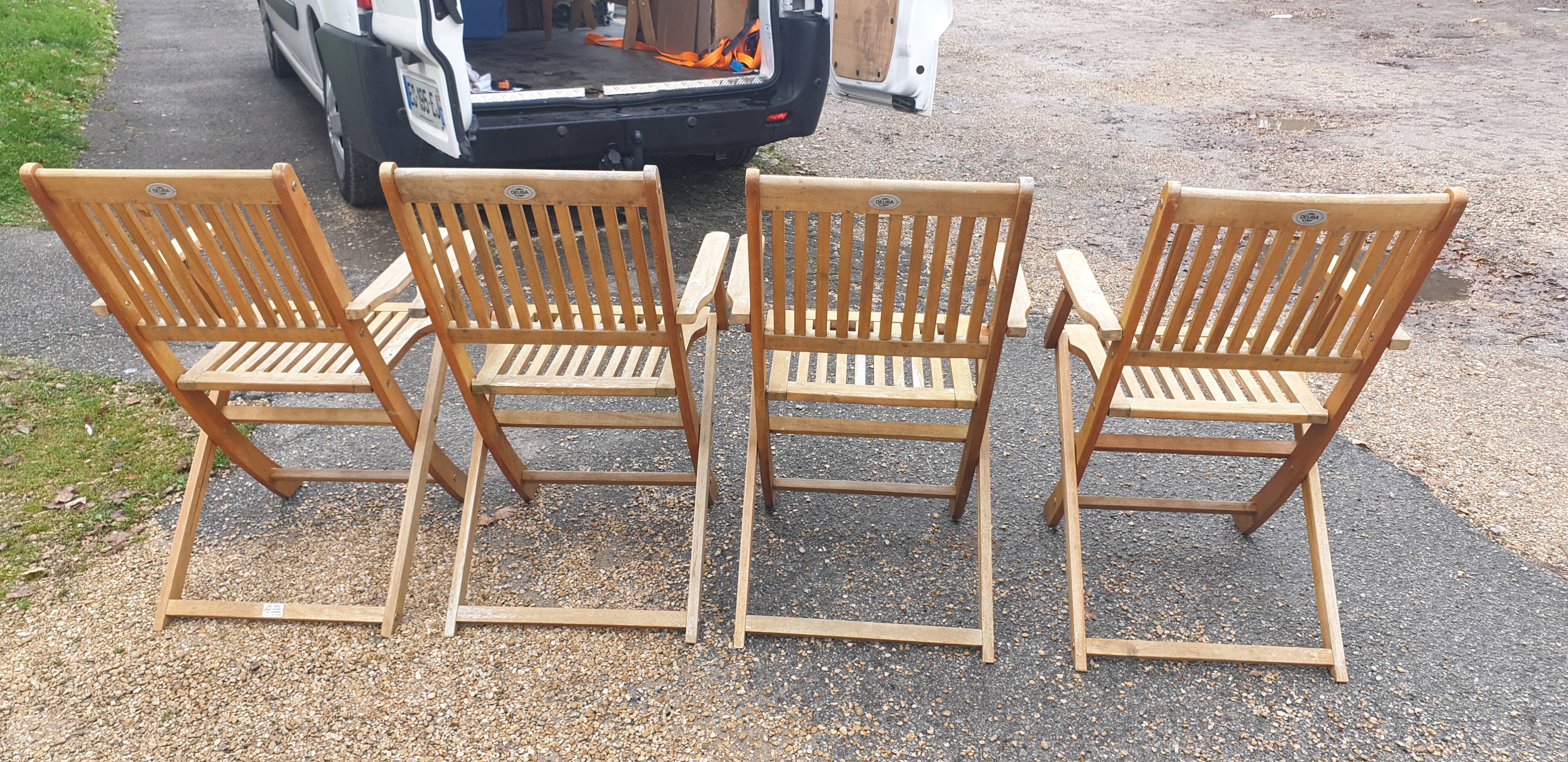 Teak garden armchairs