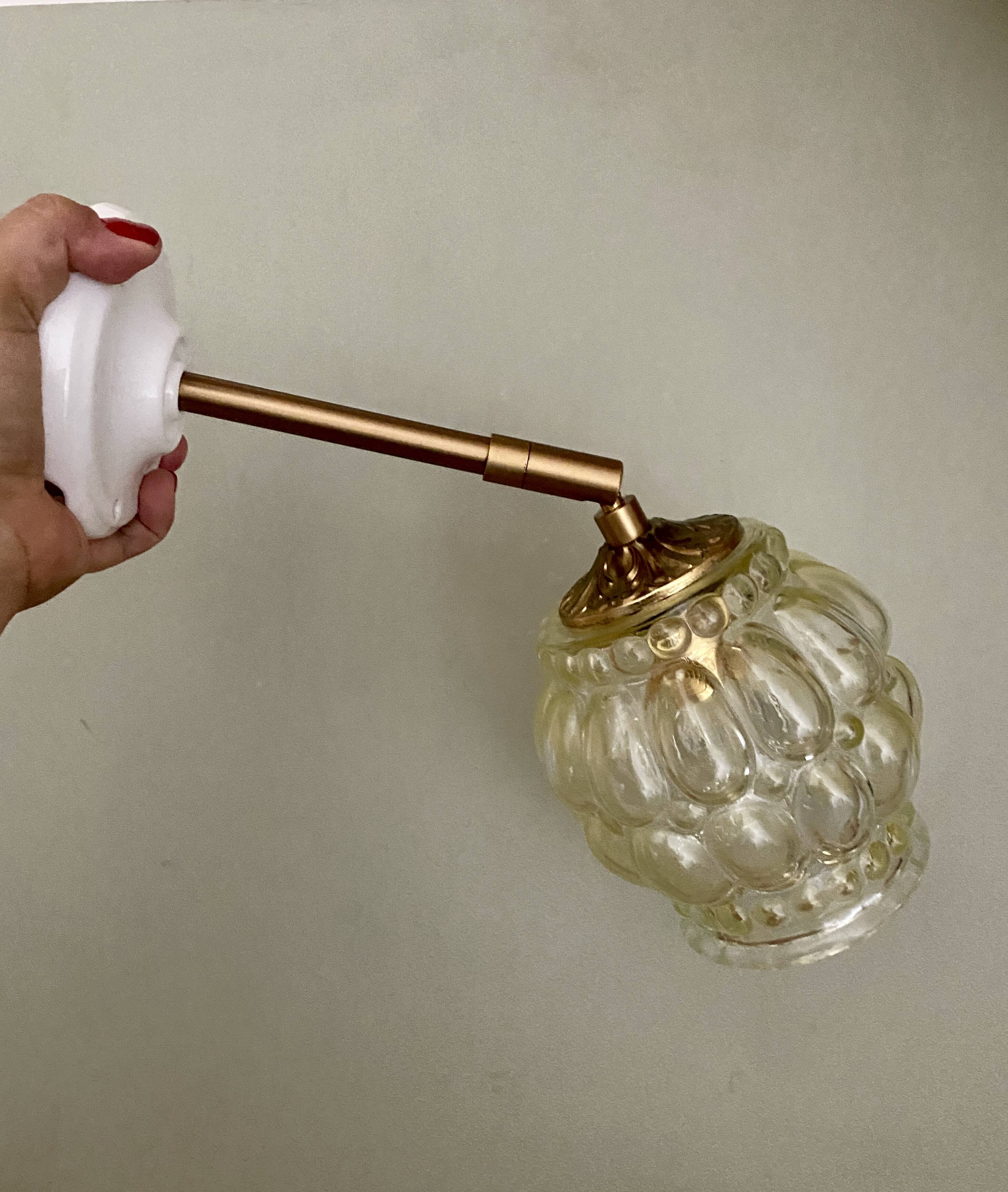 Vintage amber glass globe wall light