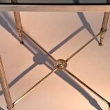 Gold brass side table in neoclassical style, circa 1960.