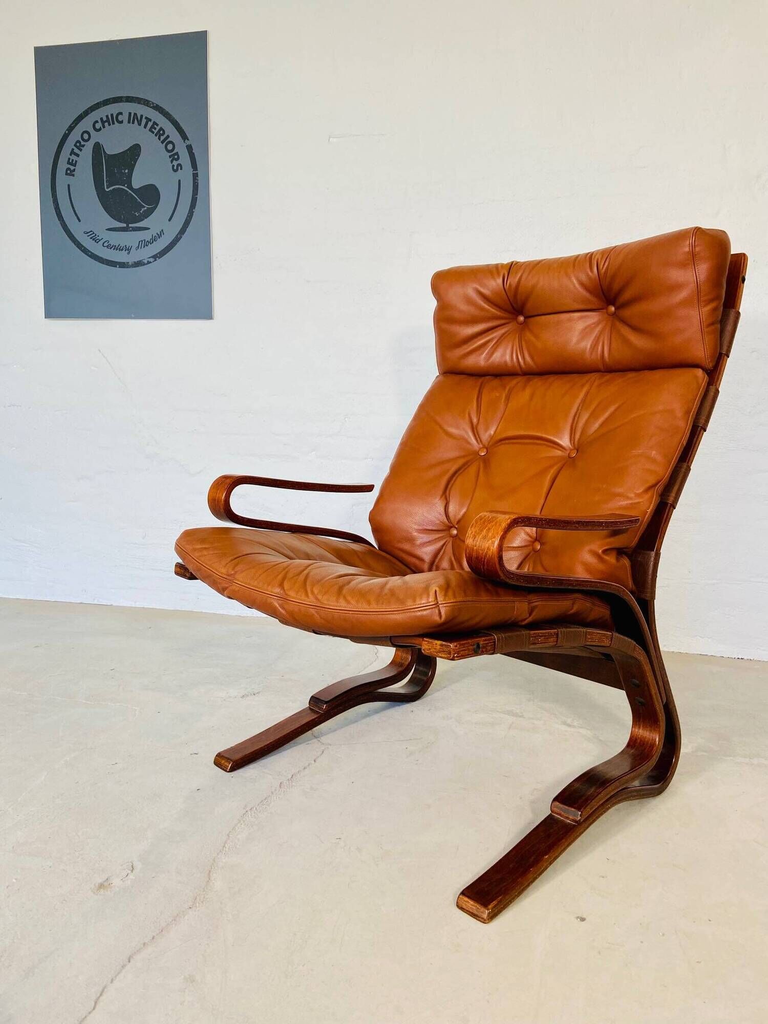 Vintage scandinavian cognac lounge chair by oddvin rykken 1960s