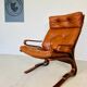 Vintage scandinavian cognac lounge chair by oddvin rykken 1960s