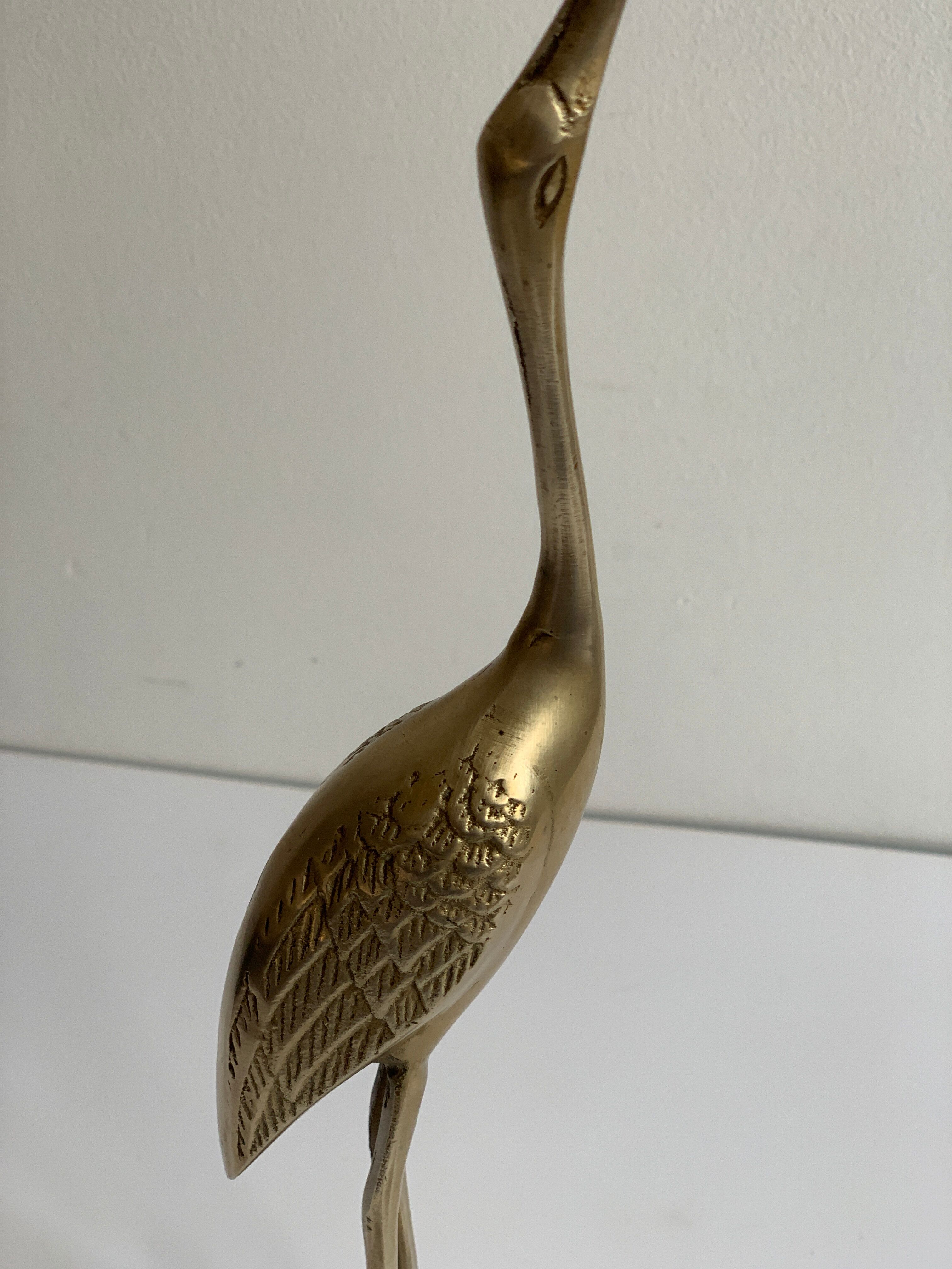 Brass heron