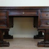 Unusual Renaissance style center desk made in the mid-19th century in walnut