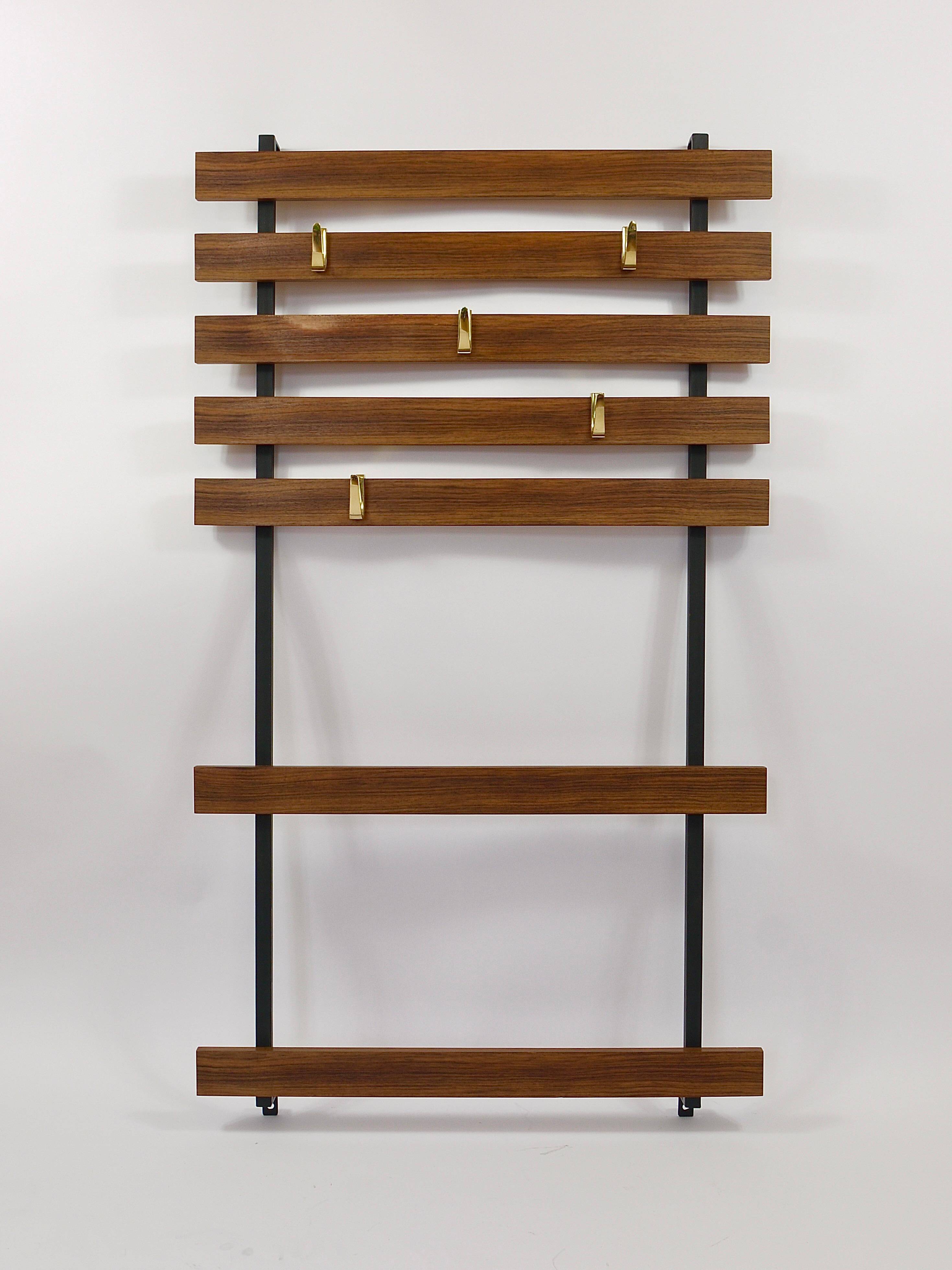 Wall coat rack by Carl Aubock with 5 brass hooks, walnut, iron, Austria, 1950s.