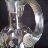 Wine carafe on foot, in cut and enameled glass