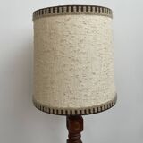 Brutalist floor lamp in turned wood, in the style of Charles Dudouyt.