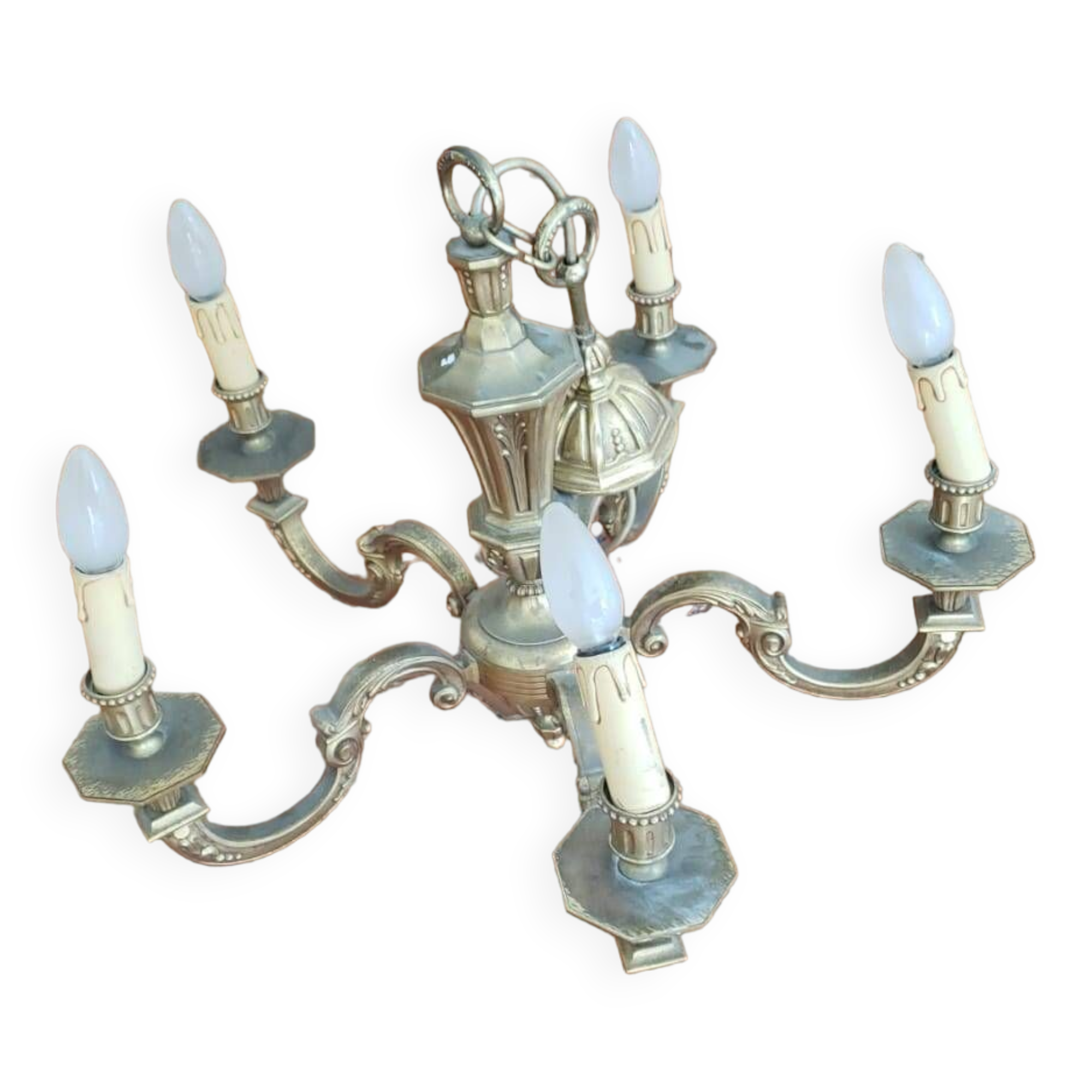 Large old chandelier in gilded brass