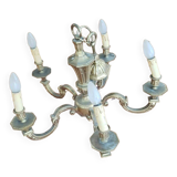 Large old chandelier in gilded brass