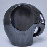 Two iridescent black and white ceramic elephants design