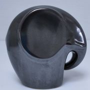 Two iridescent black and white ceramic elephants design