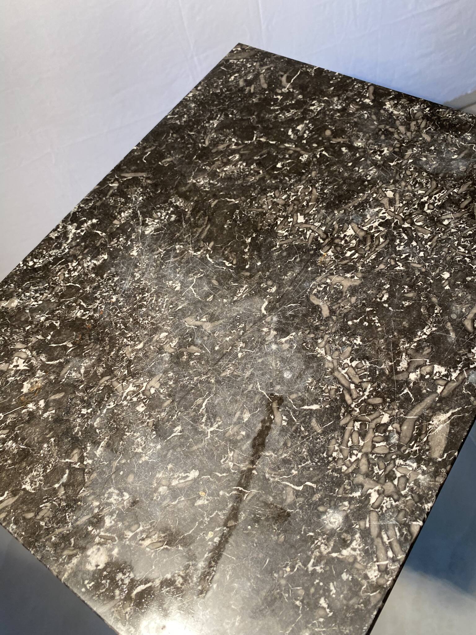 Vintage bedside table with marble top