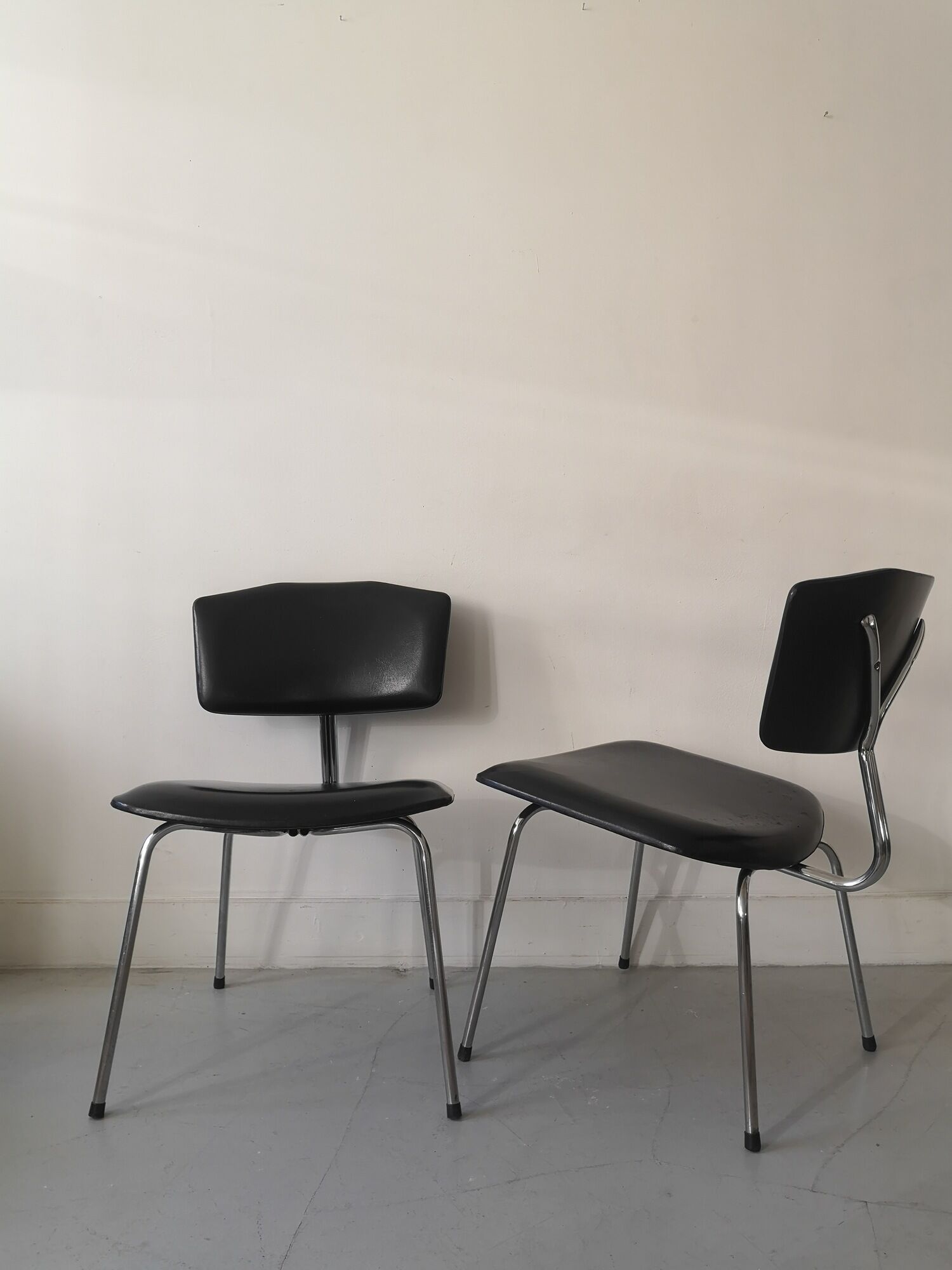 Pair of heaters design in black skai leather and metal, 1970
