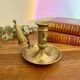 Brass cellar rat candle holder