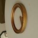 Small vintage oval mirror in gilded resin from the 60s/70s.