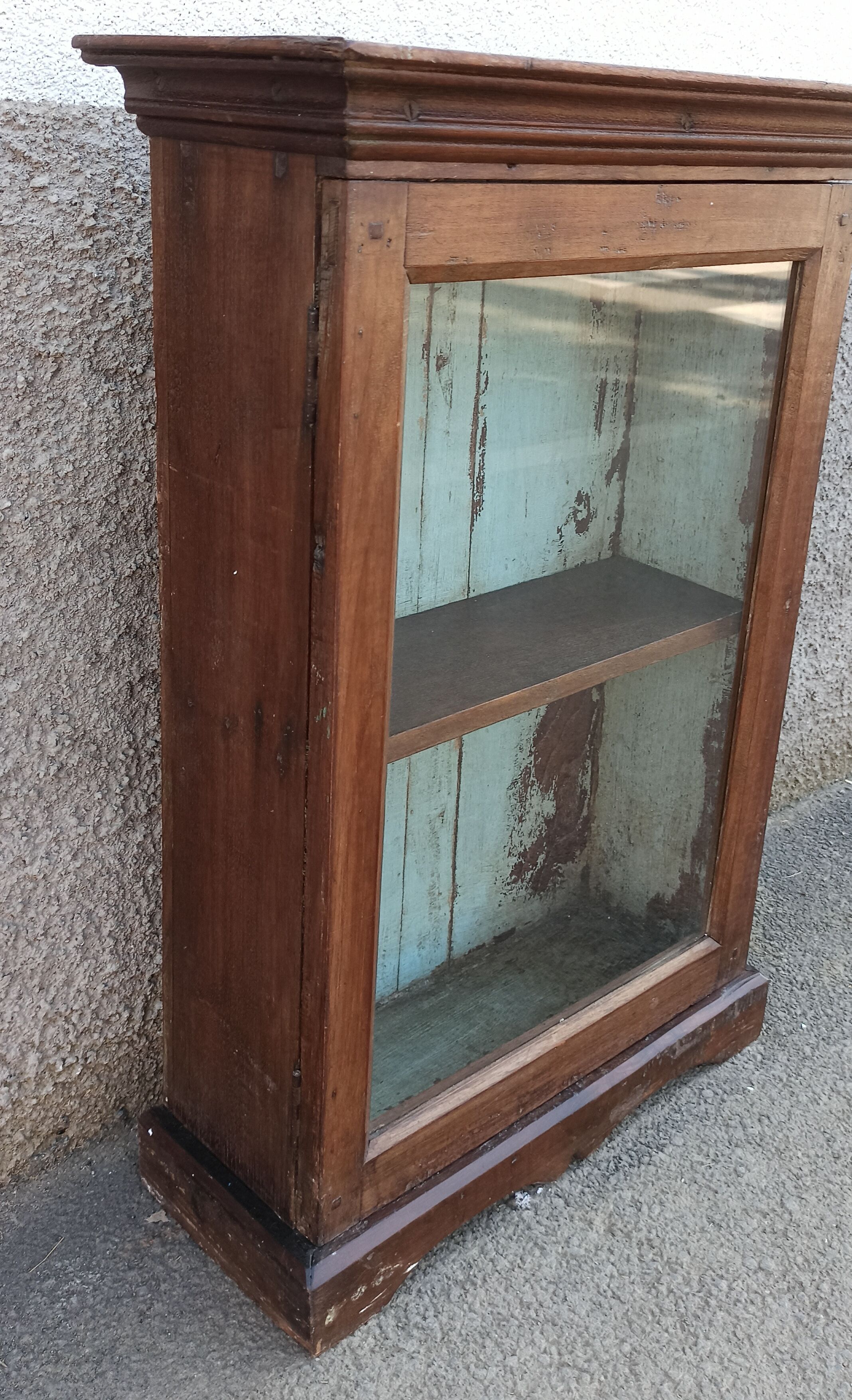 Old wardrobe with glass door