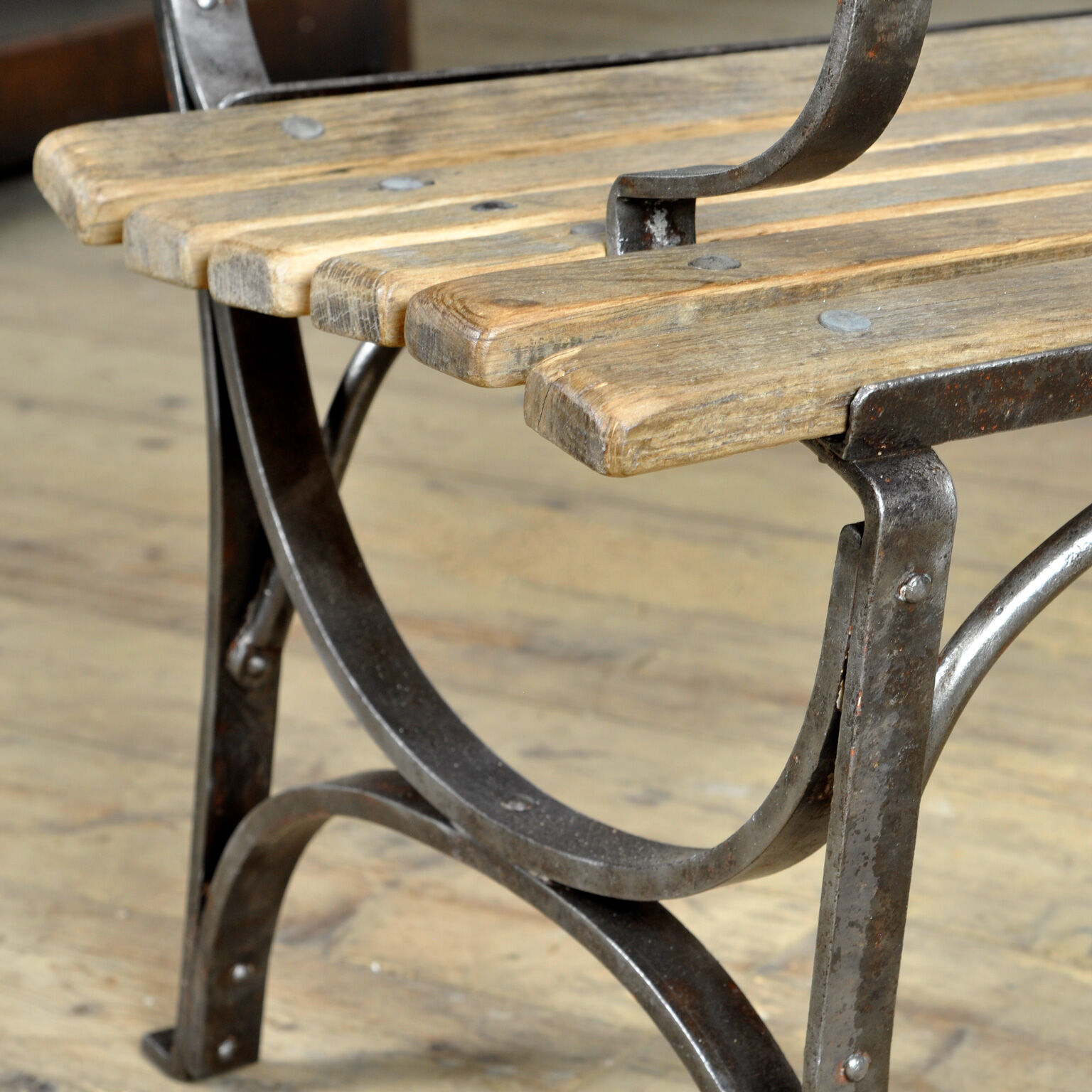 Riveted iron park bench 1920s