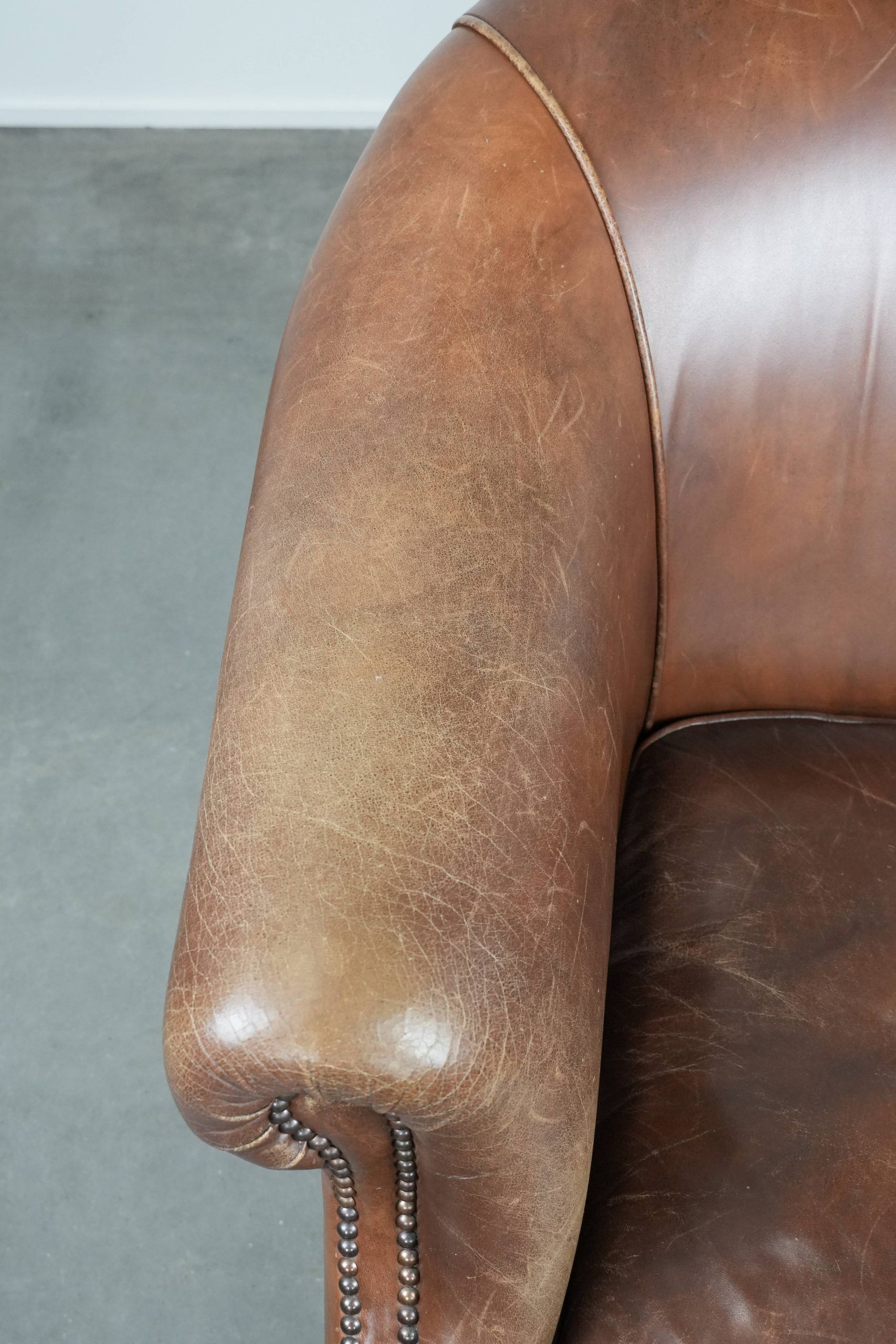 Cognac-coloured vintage cow leather club armchair in English style