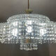 Vintage lucite chandelier with a cascade of crystal pendants from the 1970s.