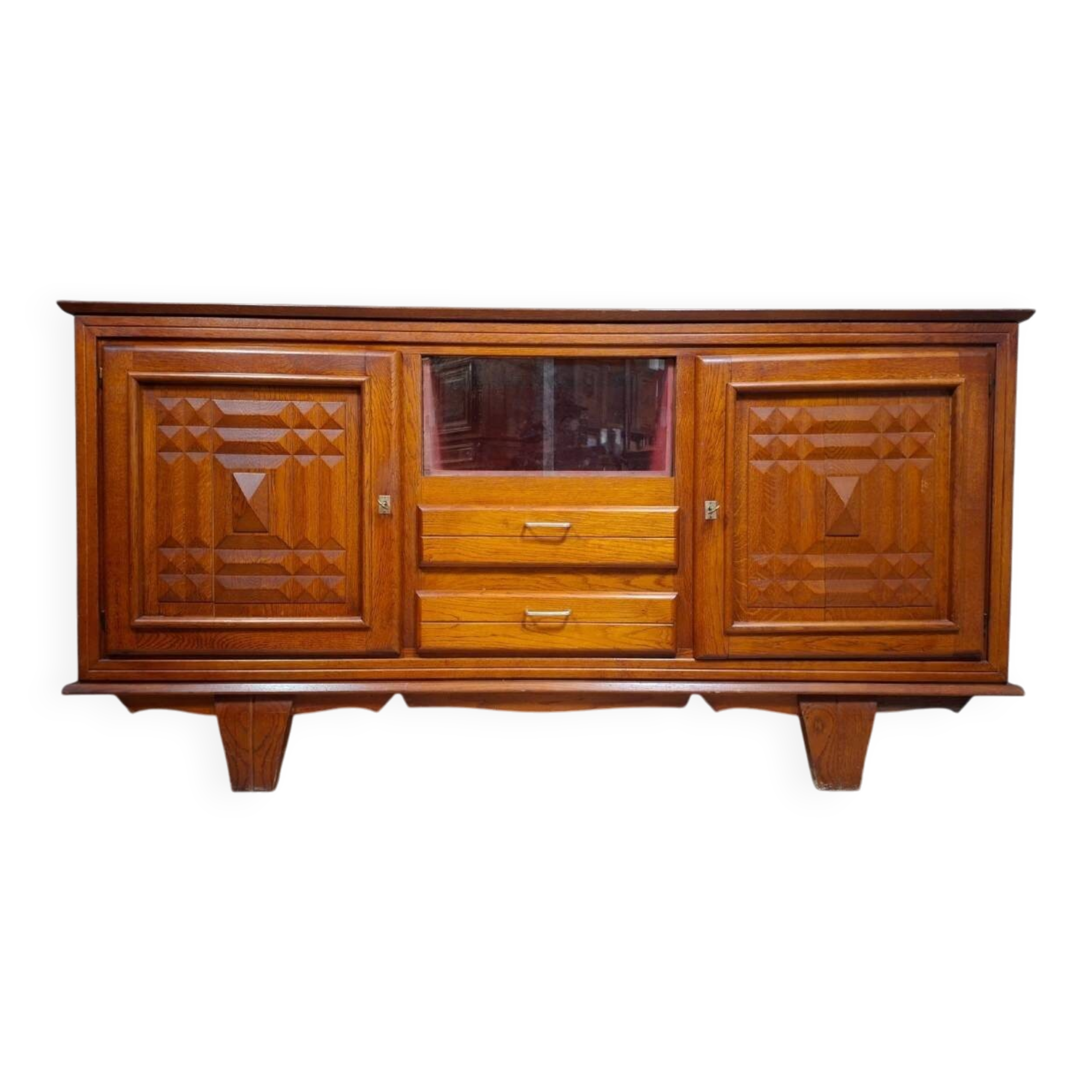 Low buffet in carved oak, Art Deco style, circa 1930.