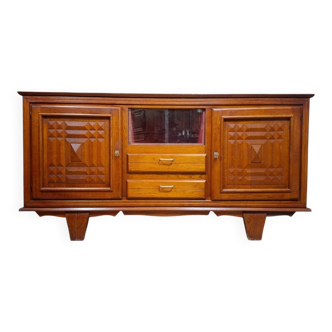 Low buffet in carved oak, Art Deco style, circa 1930.