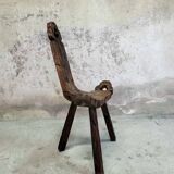 Brutalist tripod low chair
