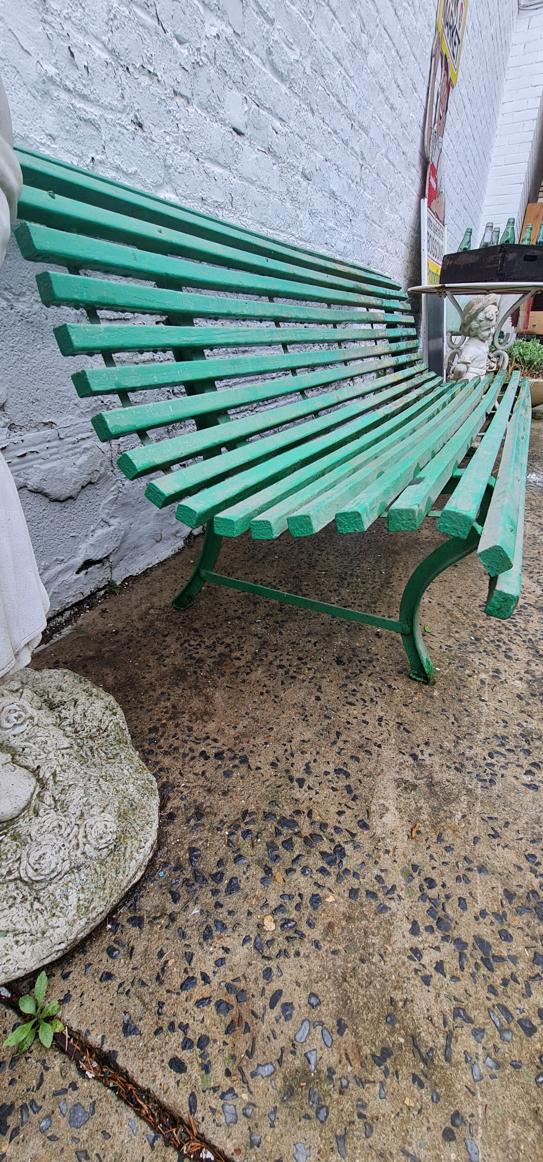 Old green garden bench Latte and wrought iron