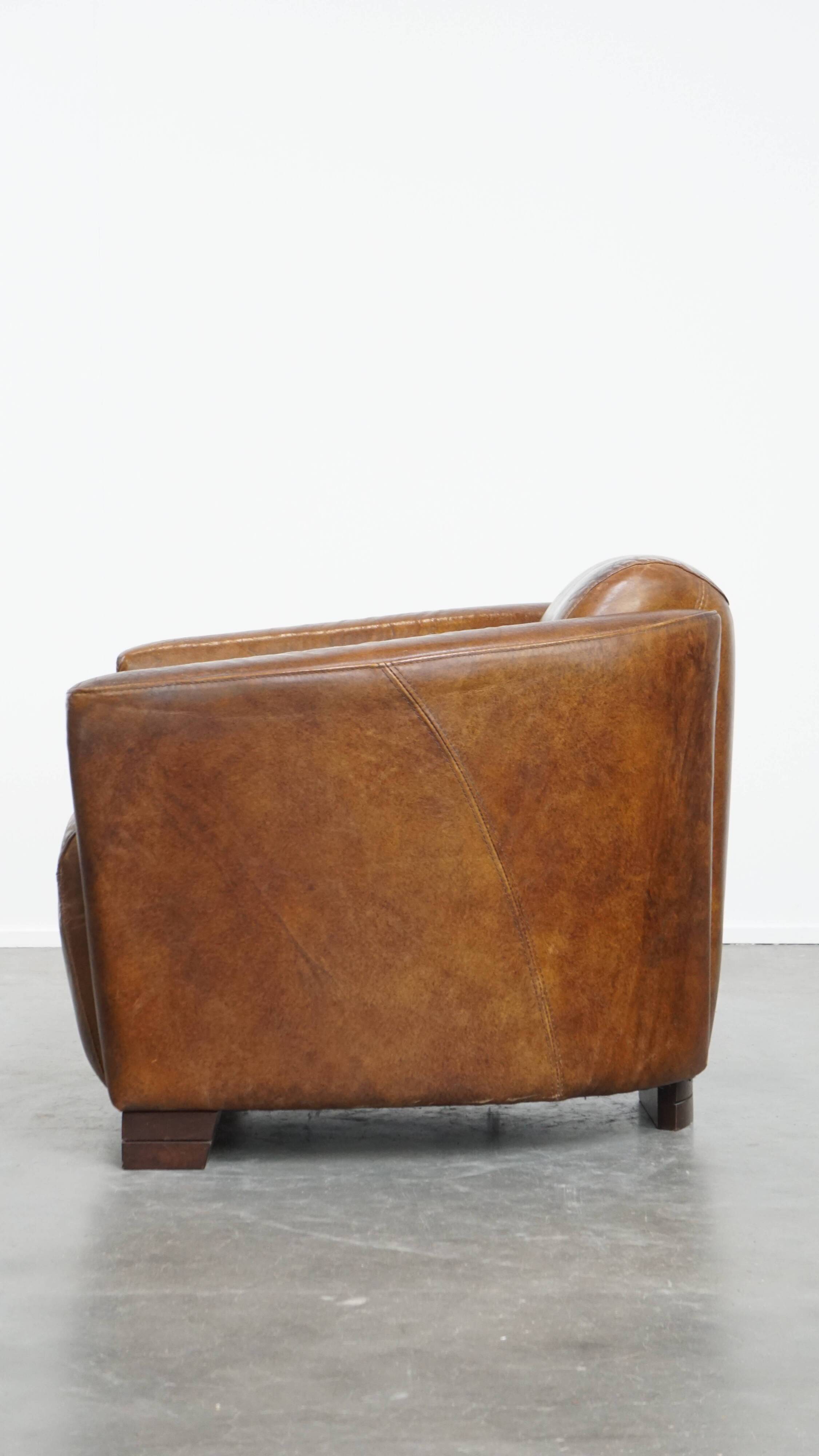 Brown Aviator design armchair made of cowhide leather