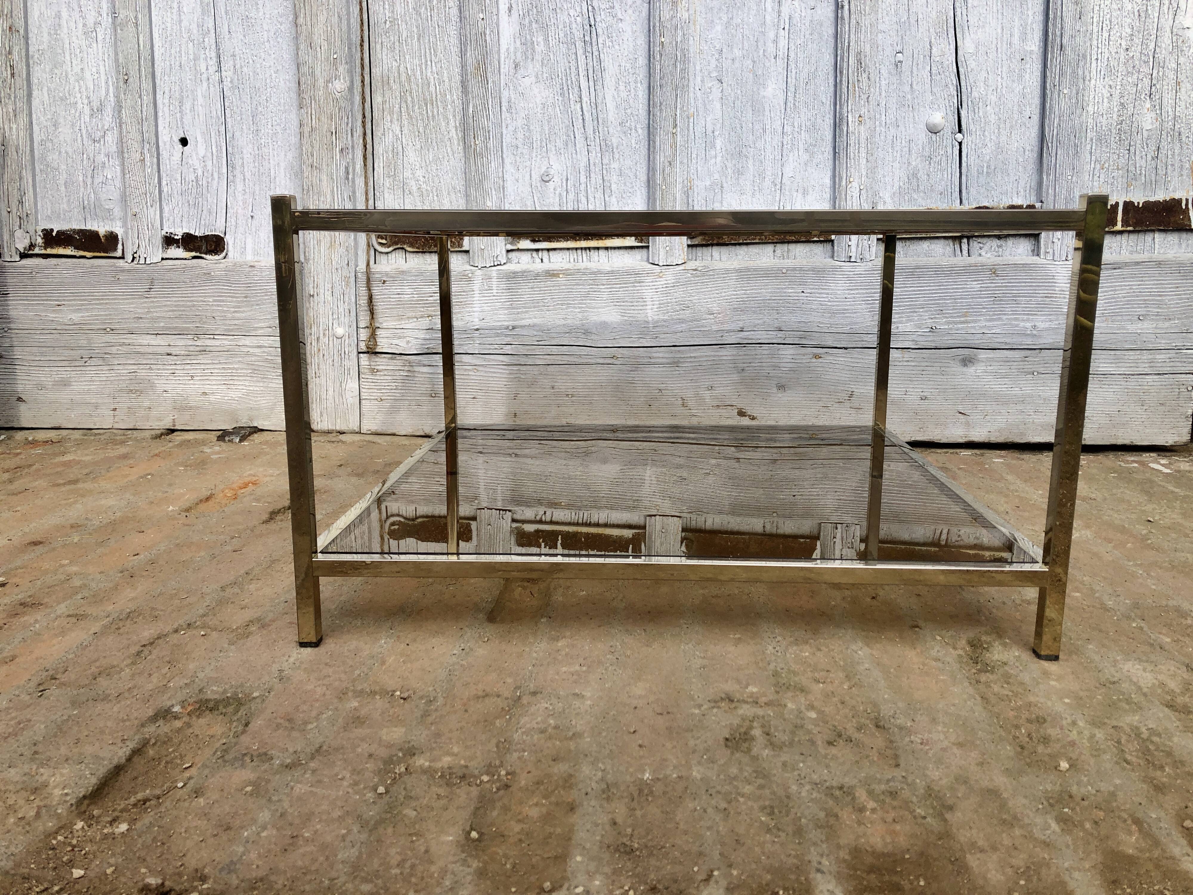 Square brass coffee table and smoked glasses