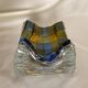 Checkerboard glass ashtray from the 1980s